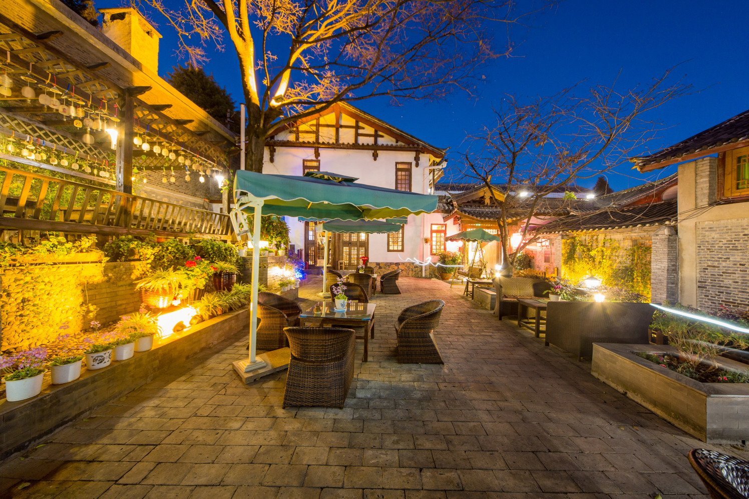 管理客栈 去哪儿客栈民宿 丽江客栈 丽江古城斑斓精品度假花园庭院